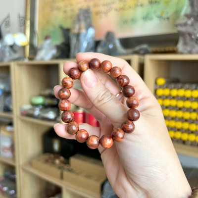 Vòng tay gỗ nu huyết Long - size 10li - Thấu quang - Mùi thơm vĩnh viễn