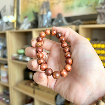 Vòng tay gỗ nu huyết Long - size 10li - Thấu quang - Mùi thơm vĩnh viễn