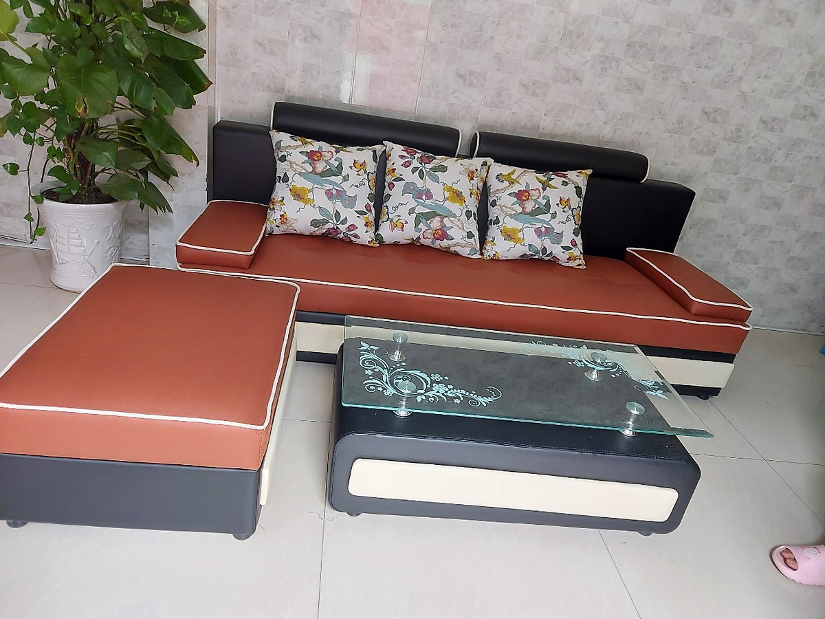 Bộ sofa văng Juno Sofa 2m2 kèm đôn 60 x 80 cm và tặng bàn Kính (màu cam)