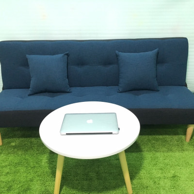 Ghế sofa bed, sofa giường xanh viền đen bố và bàn tròn GvsB