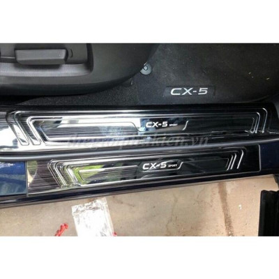 Bộ sản phẩm ỐP BẬC CỐP VÀ BẬC CỬA vân Titan xe Mazda CX5, CX-5 2018