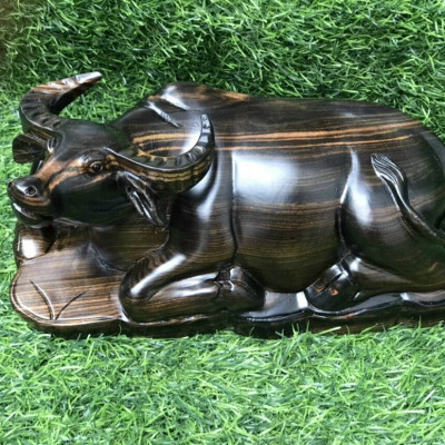 Tượng con trâu tài lộc , bằng gỗ mun kt 30×12,5×12,5cm