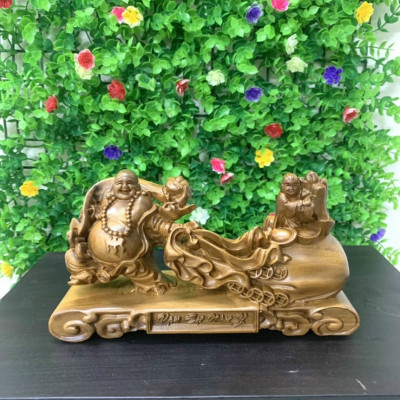 Tượng phật di lặc kéo bao tiền bằng gỗ bách xanh thơm nức kt 20×12×6cm