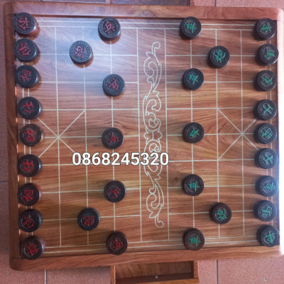 Bộ bàn cờ tướng gỗ hương đá 55×60×8cm + quân gỗ trắc kt 4.5×1.6cm víp