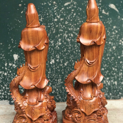 Tượng phật bà quan âm bồ tát cưỡi rồng được làm bằng gỗ hương đá kt 50×16×15cm