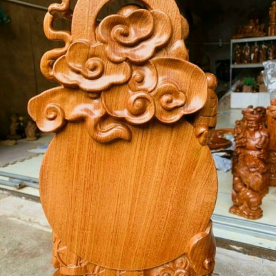 Tượng phật di lặc tay nâng tiền vàng  bằng gỗ hương đá liền khối kt cao 50×27×11cm 