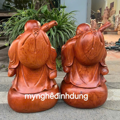 Tượng phật di lặc đắt cò bằng gỗ hương đá cao 50cm
