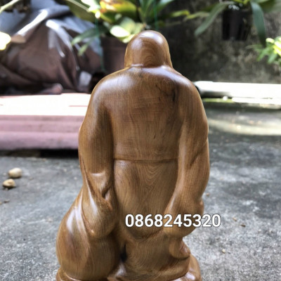 Tượng phật di lặc kéo bao vàng bằng gỗ bách xanh thơm nức kt cao 15×8.8×6cm 
