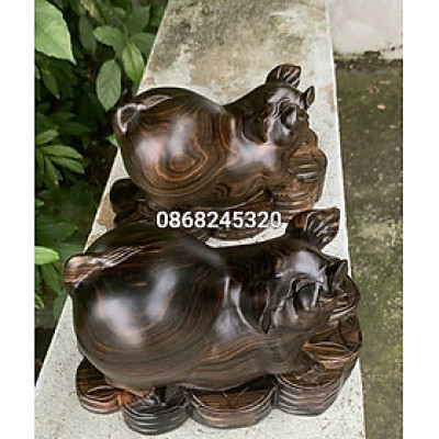 Tượng con heo ( lợn ) phong thủy cầu tài lộc bằng gỗ mun hoa kt 20cm 