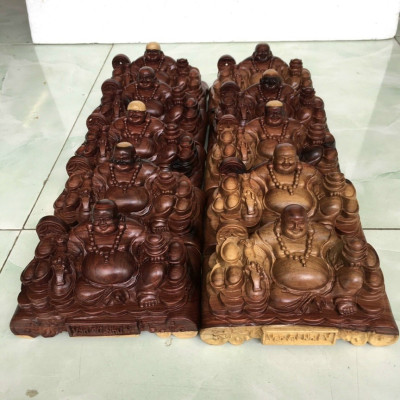 Tượng phật di lặc tay nâng thỏi vàng mini bằng gỗ cẩm kt 15×8×8cm