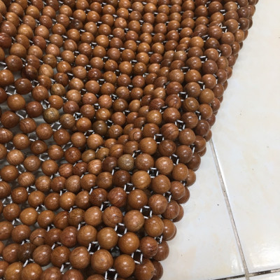 Tấm đệm lót hạt gỗ dành cho xe ô tô