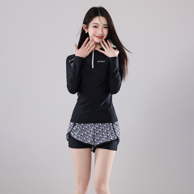 Đồ Bơi Nữ Dài Tay Quần Đùi